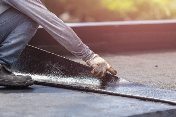 Professional Emergency Waterproofing technician working in Riverside, MD